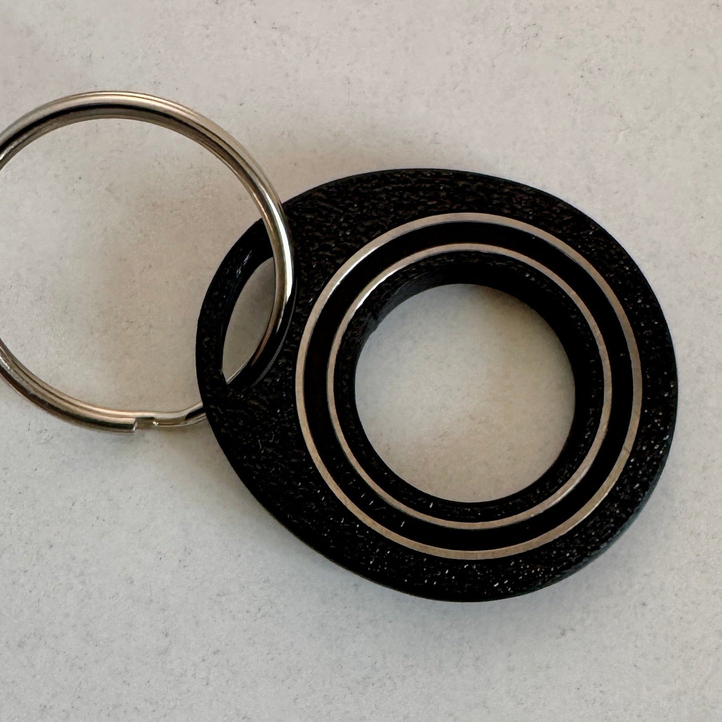Ringk – Drehbarer Fidget Schlüsselanhänger mit Kugellager | Fidget-Gadget