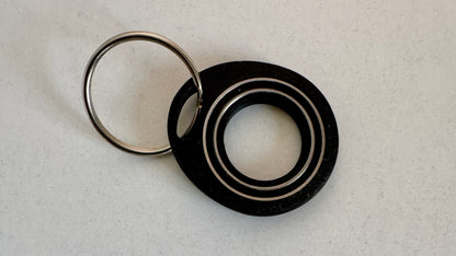 Ringk – Drehbarer Fidget Schlüsselanhänger mit Kugellager | Fidget-Gadget
